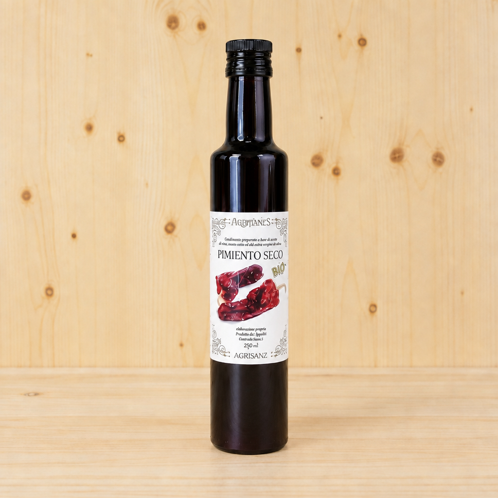 Aceite de oliva virgen extra aromatizado con pimiento seco BIO AGRISANZ, frontal cuadrada con el bote ampliado